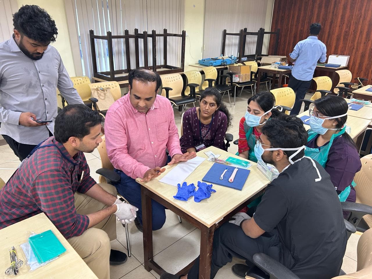 Students practicing laparoscopic simulation techniques