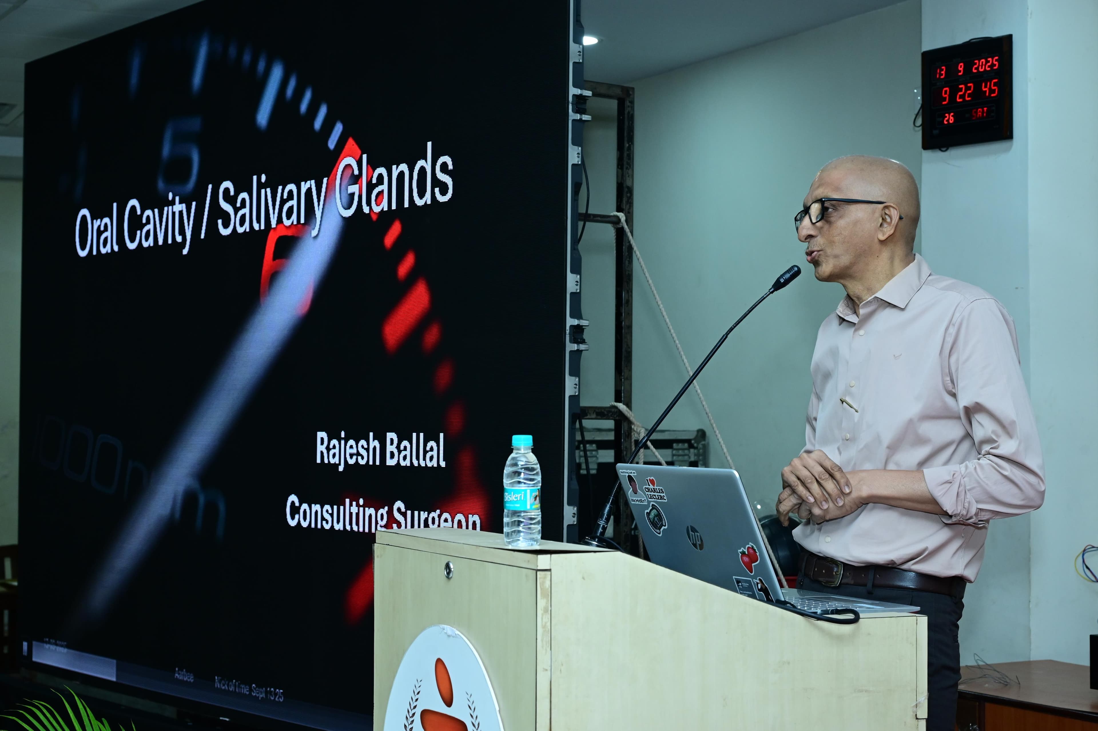 Faculty delivering a clinically-oriented surgical lecture